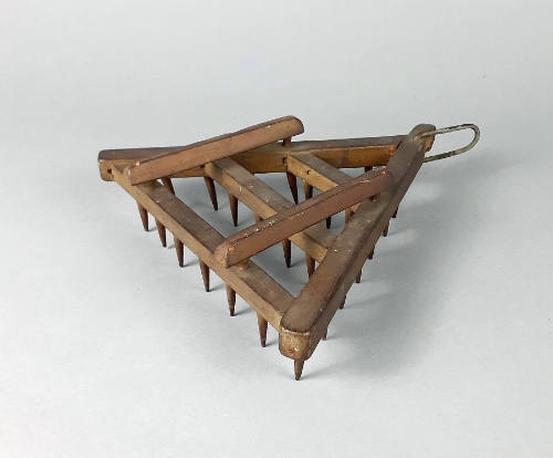 Triangle Harrow Model